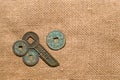 Ancient Chinese bronze coins on old cloth Royalty Free Stock Photo