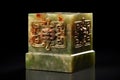 ancient chinese jade seal with ornate design