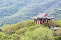 Ancient Chinese pavilion on a lush green hill Royalty Free Stock Photo