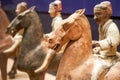 Ancient Chinese pottery figurines riding horses Tang Sancai close-up Royalty Free Stock Photo