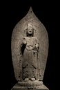 Ancient chinese standing Bodhisattva buddha limestone statue image in Northern Qi dynasty, dated 552, China