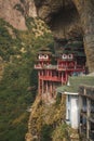 Ancient Chinese Temple: Lingtong Temple, which was built in the middle of the cliff in Lingtong Mountain Royalty Free Stock Photo