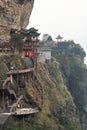 Ancient Chinese Temple: Lingtong Temple, which was built in the middle of the cliff in Lingtong Mountain Royalty Free Stock Photo