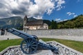 Church of Pinzolo with war cannon - Trentino Italy Royalty Free Stock Photo
