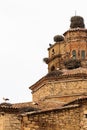 Ancient church of Seros covered with stork nests in Spain