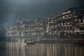 Ancient city of China, Fenghuang. Wood houses on water. Village of the phoenix