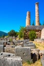 Ancient city of Delphi with ruins of the temple of Apollo. Royalty Free Stock Photo