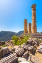 Ancient city of Delphi with ruins of the temple of Apollo. Royalty Free Stock Photo