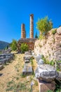 Ancient city of Delphi with ruins of the temple of Apollo. Royalty Free Stock Photo