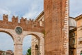 Ancient city gate with clock of Verona, Italy