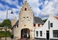 Ancient city gate and cyclist in Zierikzee Royalty Free Stock Photo