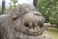 Polonnaruwa, Sri Lanka: 03/17/2019: Ancient City of Polonnaruwa the royal palace ornately carved lion with statue. World