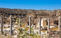 Ancient city ruins. Side. Colonnaded road and market place