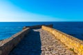 Ancient city wall of white medina of the town Asilah at ocean coast, Morocco Royalty Free Stock Photo