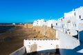 Ancient city wall of white medina of the town Asilah at ocean coast, Morocco Royalty Free Stock Photo