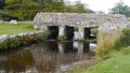 Ancient clapper bridge on Dartmoor in South West England Royalty Free Stock Photo