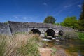 The ancient clapper bridge at Postbridges Royalty Free Stock Photo