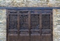 Ancient classic wooden door with typical Chinese architecture style pattern and woodcarving