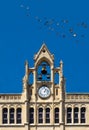 Ancient Clock on a Bell Tower at Narbonne city hall Royalty Free Stock Photo