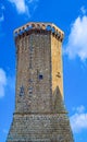 The ancient clock tower, symbol of the ancient village of Marta, on the shore of the Bolsena Lake in Italy. Royalty Free Stock Photo