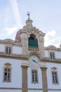 Ancient clock tower with weather vane Royalty Free Stock Photo