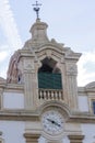 Ancient clock tower with weather vane Royalty Free Stock Photo