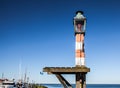 Ancient coastal lamp on a pier in Volendam village