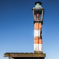 Ancient coastal lamp on a pier in Volendam village