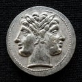 Ancient coin showing two-headed Roman god Janus, 225-214 BC