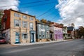 Ancient colored brick houses and streets under the autumn sky. Architecture of the old American town of Cumberland