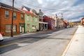 Ancient colored brick houses and streets under the autumn sky. Architecture of the old American town of Cumberland