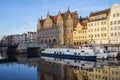 Ancient colored houses on the promenade of the river at dawn in Gdansk. Poland