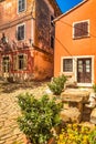 Ancient colorful houses on a stone street in Groznjan village