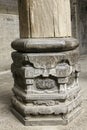 Ancient column base, made of stone. Royalty Free Stock Photo