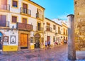 The ancient column at the corner of Mezquita wall, on Sep 30 in Cordoba, Spain