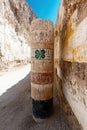Ancient column with hieroglyphs and a four-leaf clover Royalty Free Stock Photo