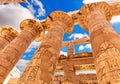 Ancient Columns with beautiful carvings, Karnak Temple, the Great Hypostyle Hall, Luxor, Egypt Royalty Free Stock Photo