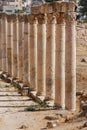 Ancient columns from Jerash Roman city in Jordan. Cardo or Colonnaded street Royalty Free Stock Photo