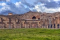 Ancient columns ruins after the eruption of Vesuvius in Pompeii, Italy