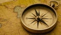 Ancient compass on an antique world map Royalty Free Stock Photo