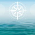 Ancient compass on a sea background