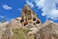Ancient conical rock of Cappadocia against blue sky. Royalty Free Stock Photo