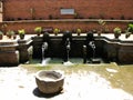 Ancient cool water fountain in Durbar Square, Patan, Kathmandu, Nepal Royalty Free Stock Photo