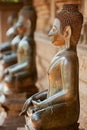 Ancient copper Buddha statues located outside of the Hor Phra Keo temple in Vientiane, Laos.