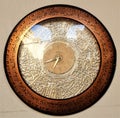 Ancient copper clock close up. arabic religion watch
