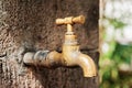 Ancient copper water tap Royalty Free Stock Photo