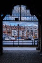 Ancient crane - zuraw Old town in Gdansk. The riverside on Granary Island reflection in Moltawa River. Visit Gdansk