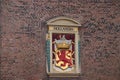 Ancient crest of the state of Hollandia, latin for Holland on the old prison and torture place named Gevangenpoort in The Hague, t Royalty Free Stock Photo