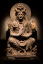 Ancient cross-legged Bodhisattva schist statue image in 2nd century, Kushan dynasty from Gandhara, Pakistan