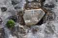 Ancient cross on the wall of ruined Greek Orthodox Church
